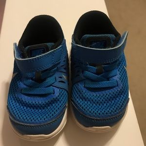 Blue Nike tennis shoes toddler boy